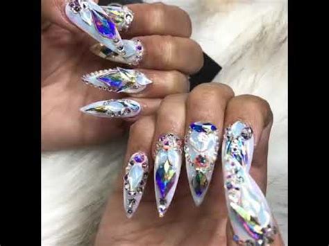 Russian salon is slammed over 'racist' 3d nail art depicting rap star cardi b with noticeably darker russian manicurist nail sunny have been slammed over latest 3d design the salon was criticised over a figure of cardi b with noticeably darker skin CARDI B SHOWS OFF HER EXOTIC NAILS - YouTube