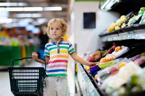 Child In Supermarket Kid Grocery Shopping Stock Image Image Of