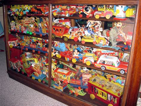 Display Case Of Vintage Fisher Price Toys Collected By Tracy Of Tracys