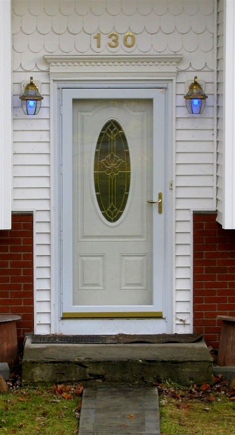 Front Door With Oval Stained Glass Window Storm Door Flickr