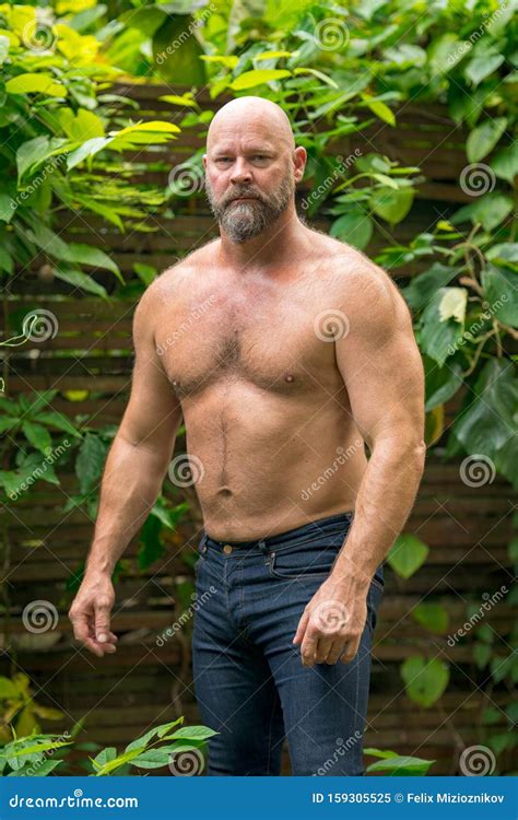 Mature Man Model Posing With A Big Camera Outdooors Hoodoo Wallpaper
