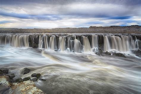 Time Lapse Photo Of Water Falls Under Cumulus Clouds Selfoss Hd