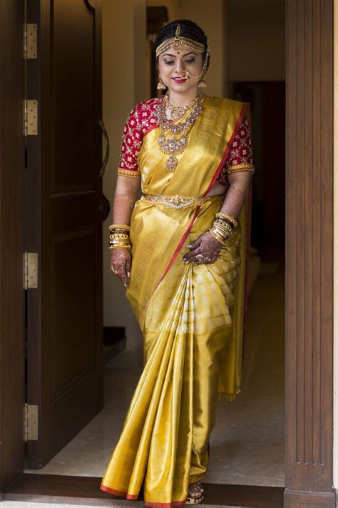 Bride In Golden Saree And Red Designer Blouse Photography Suhitha