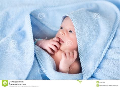 Huge savings for baby boy hooded bath towels. Sweet Newborn Baby Boy In Big Blue Towel After Bath Stock ...