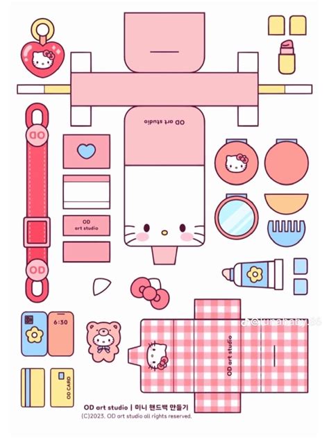 The Paper Doll Is Made To Look Like Hello Kitty