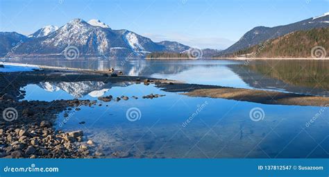 Lake Walchensee With Reflecting Mountain Range End Of Winter Stock