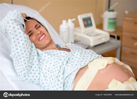 Pregnant Woman In Delivery Room Stock Photo By ©ttomsickova 166335946