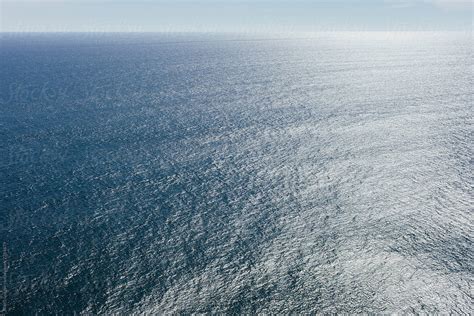 View From Above Of Vast Ocean And Sky By Rialto Images