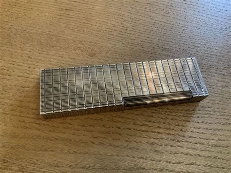 Ce nouvel accessoire signé s.t. Briquet de table st Dupont - Luckyfind