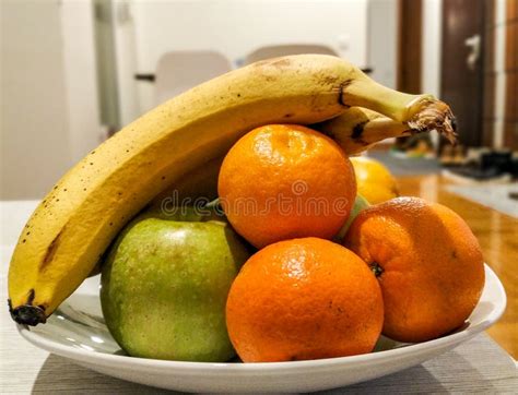 Bowl Of Fruit Apple Oranges And Banana On The Table Stock Photo Image