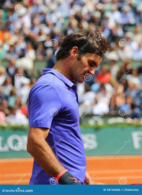 Seventeen Times Grand Slam Champion Roger Federer In Action During His