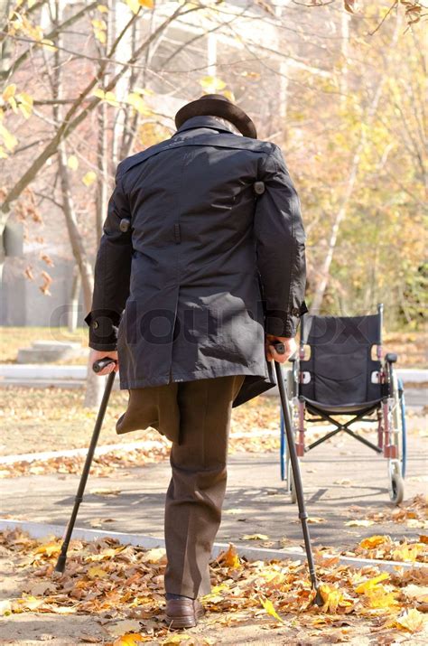 Handicapped One Legged Man Walking On Crutches Stock Image Colourbox