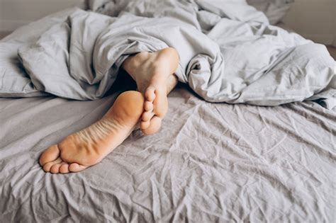 sticking your feet out of the blanket may improve your sleep scientists reveal