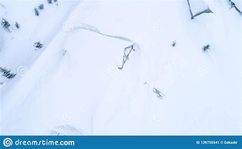 Top View Of Snow Covered Huts In Mountains Stock Image