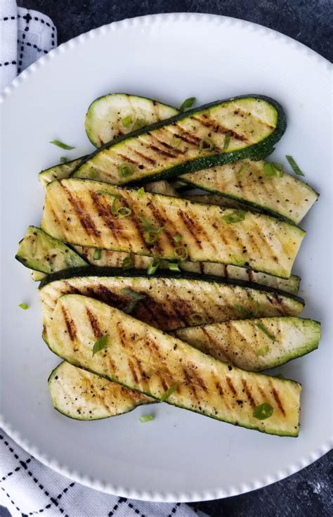 After i do that, i sprinkle on some parmesan cheese and mozzarella (the combination is wonderful!) and i place it back in the oven just until the cheese melts. Grilled Zucchini | Amanda Cooks & Styles
