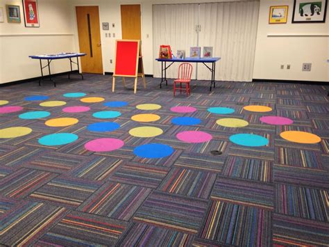 Anchor the sofa's front legs on the rug, and run the length of the rug with the length of the room. Take a seat on these Viva Colores circles within Roy G Biv Interface carpet tile | Carpet tiles ...
