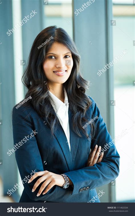 Attractive Female White Collar Worker In Office Stock Photo 111463334
