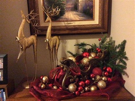 Our christmas decorations are our way of welcoming the day. Gold Reindeer and Sleigh table decor | Christmas wreaths ...