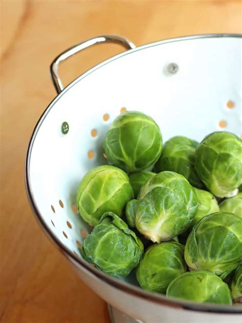 To prevent injury, wear a safety glove on the hand not holding the chef's knife. Toaster Oven Roasted Brussels Sprouts