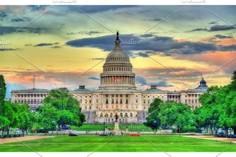 The United States Capitol Building At Night In Washington Dc Featuring