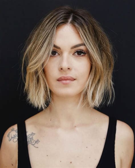 A hint of edge breaking even symmetry, a choppy cut is exciting, young, and dark brown straight hair is styled in a wild choppy manner with drastically cut strands covering one side of the face in this fun hairstyle. 15 Chic Choppy Bob Haircuts For 2018