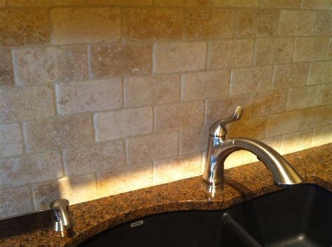 Granite Countertop And Natural Stone Backsplash Traditional Kitchen