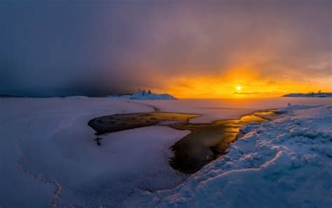 Dramatic Sunset Over Frozen Lake Wallpapers