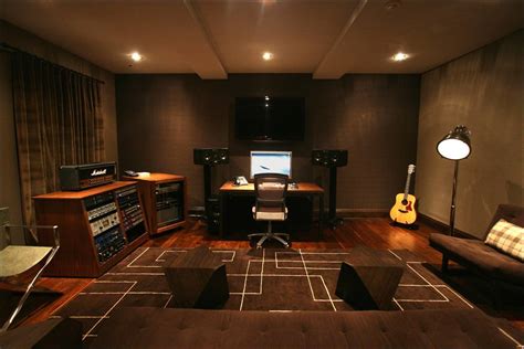 For the average family music room, use basic furnishings to absorb some sounds that normally echo off hard surfaces. Basement Music Room Ideas | BasementRemodeling.com