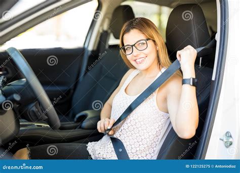 Woman Fastening Seat Belt In The Car Stock Image Image Of Street Road 122125275