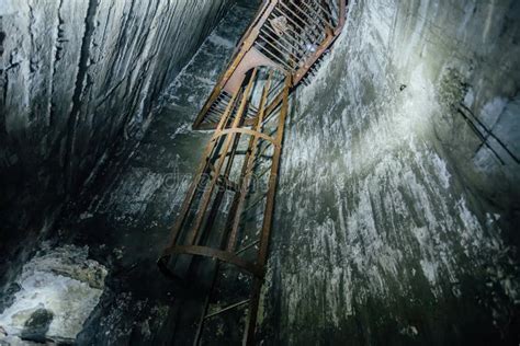 Abandoned Deep Vertical Underground Mine Shaft Old Rusty Iron Ladder