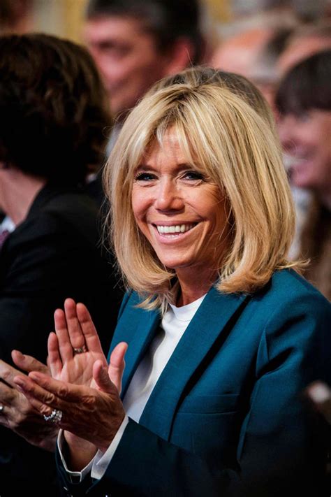 Emmanuel macron with his wife brigitte trogneux on paris match p. Brigitte Macron: Emmanuel Macron's wife wears fitted ...