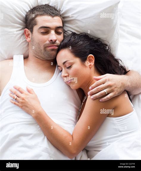 Loving Couple Lying In Bed Stock Photo Alamy