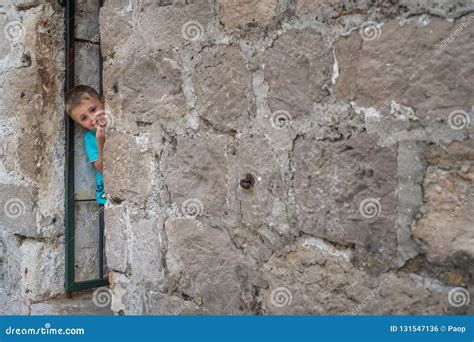 Boy Hiding Behind A Wall Stock Photo Image Of Game 131547136
