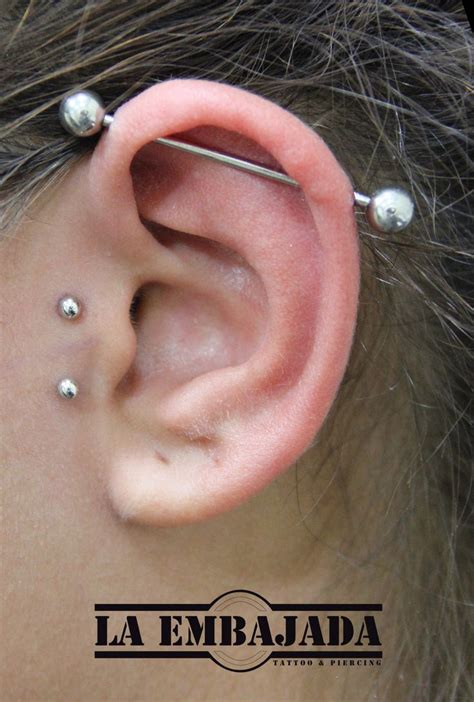 Fresh industrial & tragus surface piercing #piercing #piercingbarcelona