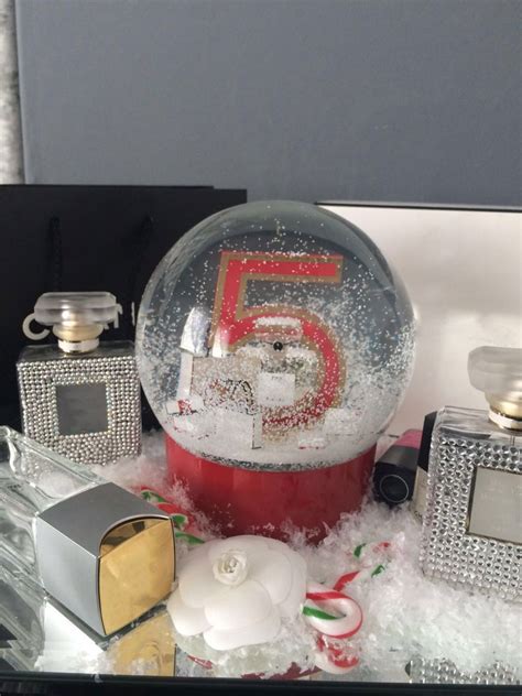 Electric Snow Globe With Red No5 Perfume Bottle Inside Snow Crystal