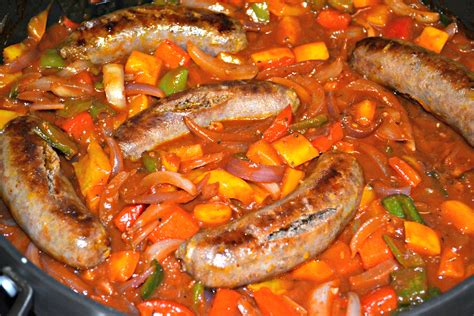 Add the peppers, onions, salt, and pepper and bring to a simmer. Sausage, Peppers and Onions in a Spicy Tomato Sauce - A ...