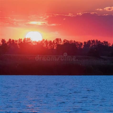 Sunset Scene Over Lake Water Surface Sunset Stock Photo Image Of