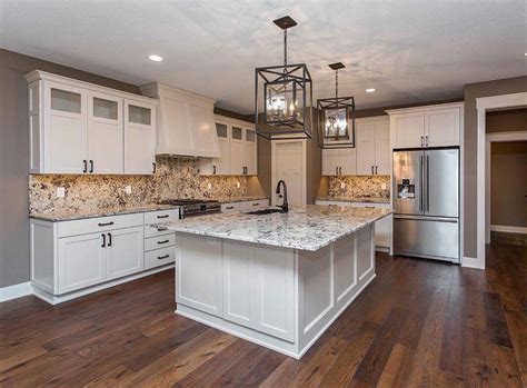 When selecting cabinets and countertops, it's when shopping for countertops and cabinets, ask the store or the contractor you're working with if they have sample pieces you can take home. Alaskan White Granite With Tile Backsplash — Randolph ...