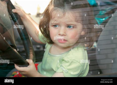Young Girl Sitting In Driver S Seat Of Car Stock Photo Alamy