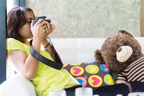 asian teen is an amateur photographer practicing photography stock image image of film rest