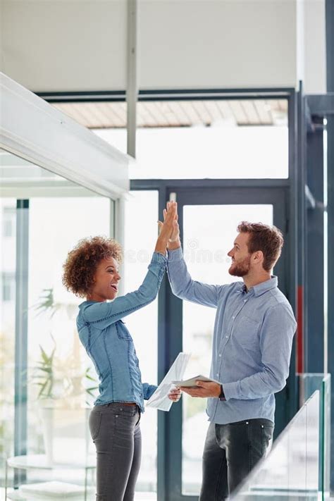 Success Is Ours At Last Two Colleagues High Fiving Each Other Other In