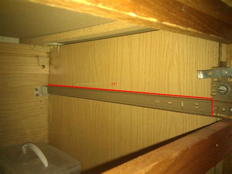 Make the legs yourself or purchase prefabricated legs (just make sure you measure the height from floor to bottom of cabinet) then install them beneath the cabinet in the toe kick space. cabinets - Will this 22" drawer slide replace the slide ...