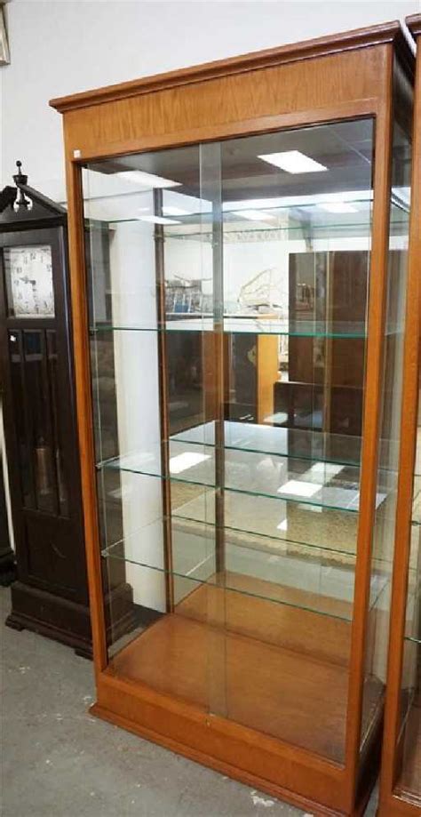 Oak Display Cabinet With A Mirrored Back Glass