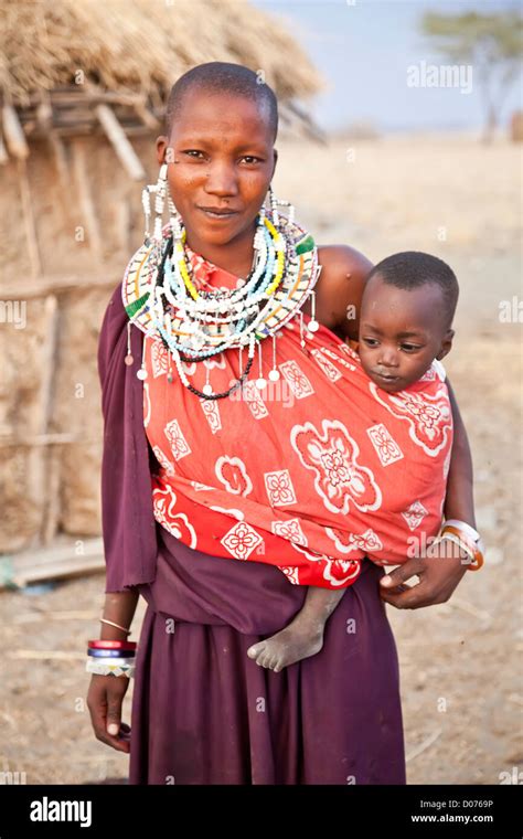 Maasai Mother With Two Babies At Tanzaniaeast Africaafricaauthentic