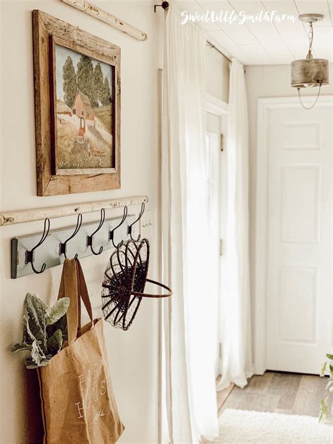 Consider our durable hook racks or coat hooks to organize outerwear, umbrellas, hats, and more. Farmhouse Entry Way | Farmhouse wall hooks, Entryway inspiration, New house living room