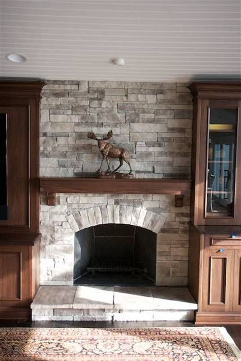Brick has traditionally been the material of choice for fireplace construction. faux brick fireplace surround | This faux or manufactured ...