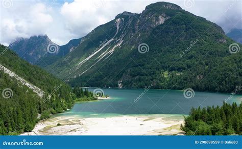 View To Julian Alps Mountains Above Predil Lake In Italy With Small