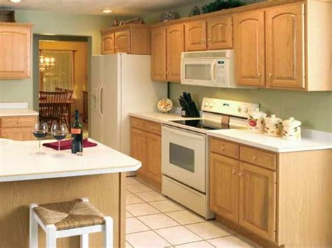 I would like to paint my kitchen cabinets off white/cream and redo my backsplash with subway tile. Kitchen Paint Colors With Oak Cabinets And White ...