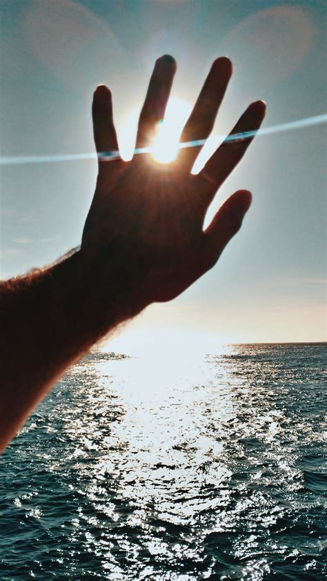 Free Images Sky Water Hand Finger Light Sunlight Sea Horizon