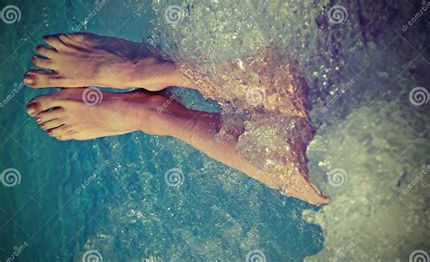 Legs Of A Lady Who Relaxes In The Hot Tub Of A Swimming Pool Stock Image Image Of Filter